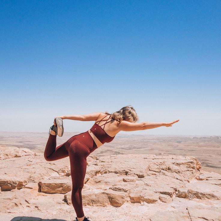 Women in a fitness class doing stretching and mobility exercises
